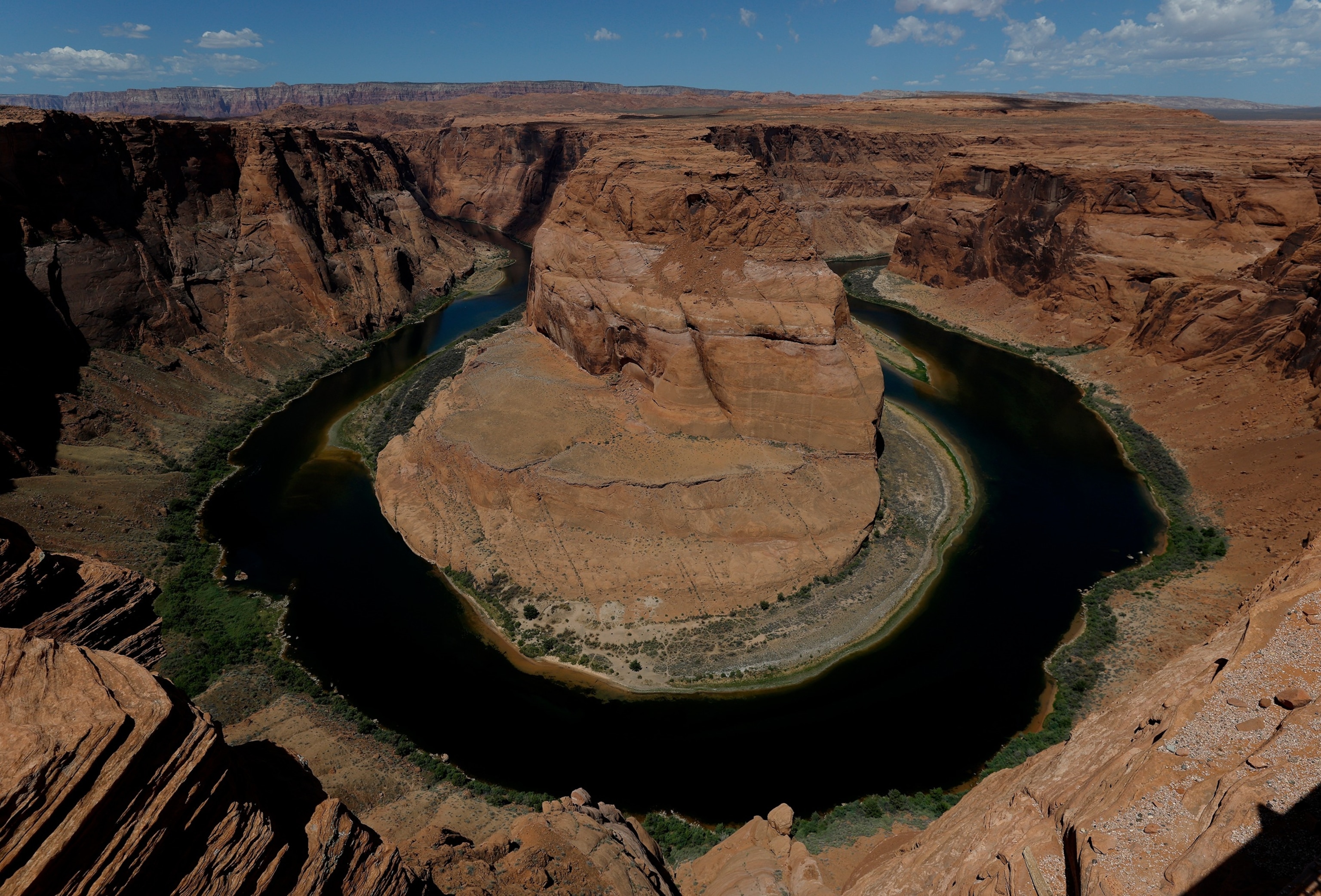 A view of the Colorado River at Horseshoe Bend on July 31, 2026 in Page, Arizona. Seven U.S. states and Mexico depend on the Colorado River Basin, which supplies water to more than 35 million people and is the water source for Lake Powell and Lake Mead.Justin Sullivan/Getty Images