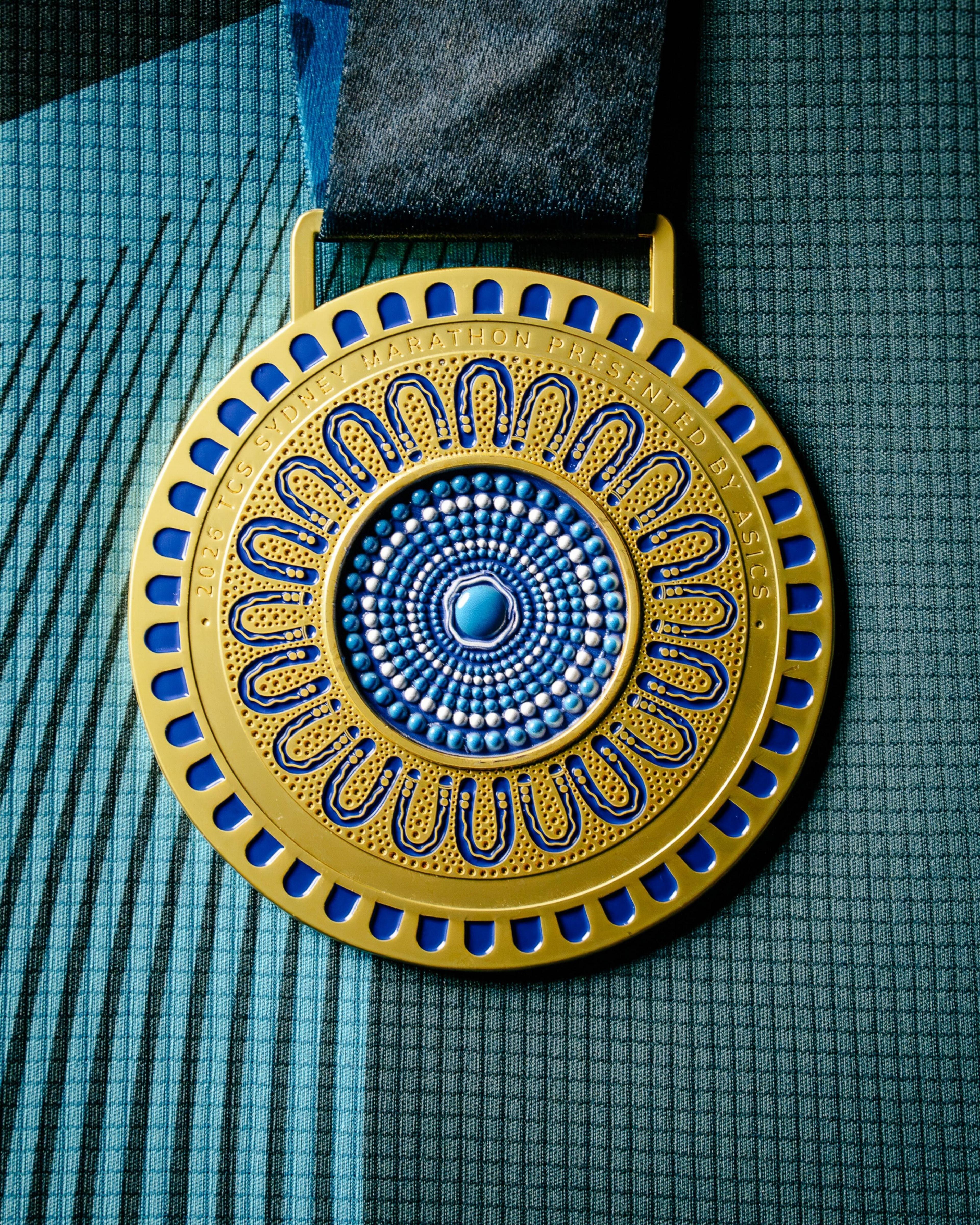 Image caption,The front of the Sydney Marathon medal features an artwork by Ambrose Killian