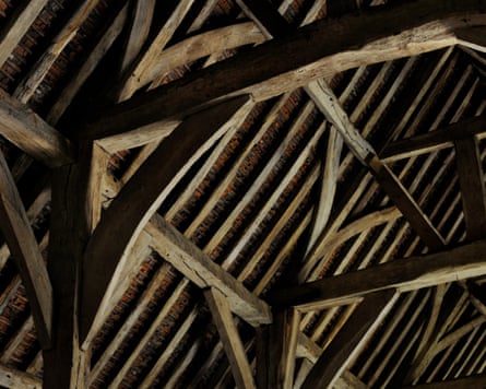 The barn’s structural timbers are more than 95% original.Photograph: Historic England