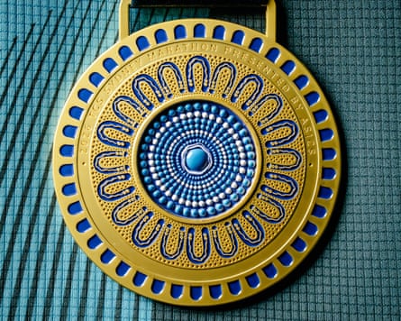 The reverse of the medal features an indigo and gold design by First Nations artist Ambrose Killian.Photograph: sydney_marathon/Instagram