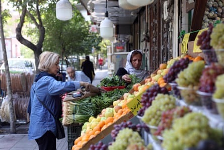 A fruit and vegetable stall at a street market in Tehran on Saturday.Photograph: Abedin Taherkenareh/EPA