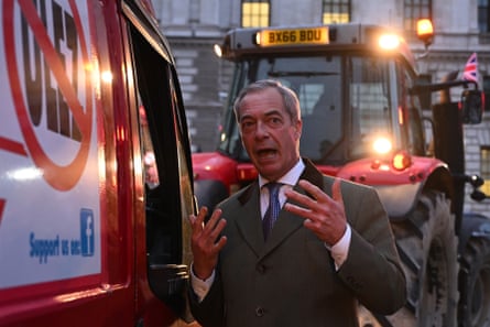 The Reform UK leader, Nigel Farage, speaks to the driver of a van taking part in a protest against London’s Ulez.Photograph: Leon Neal/Getty Images