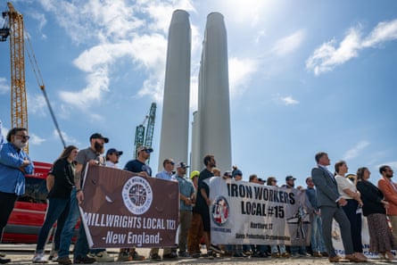 Union workers and officials at the Revolution Wind assembly site in Connecticut, after the Trump administration’s order to halt construction, in 2025.Photograph: Connecticut Public Broadcasting/Getty Images