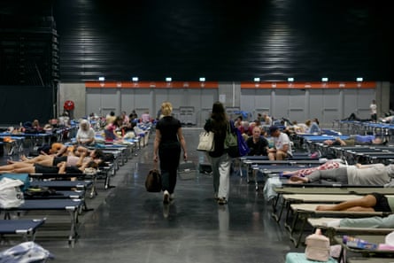 Wildfires evacuees at an exhibition centre in Bordeaux.Photograph: Alain Jocard/AFP/Getty Images