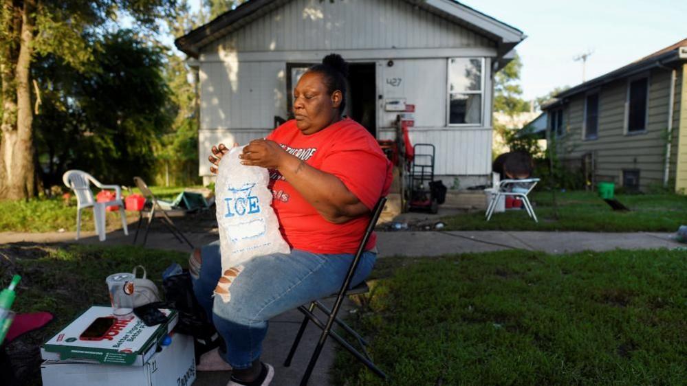 Image caption,People have used ice to cool off in Gary