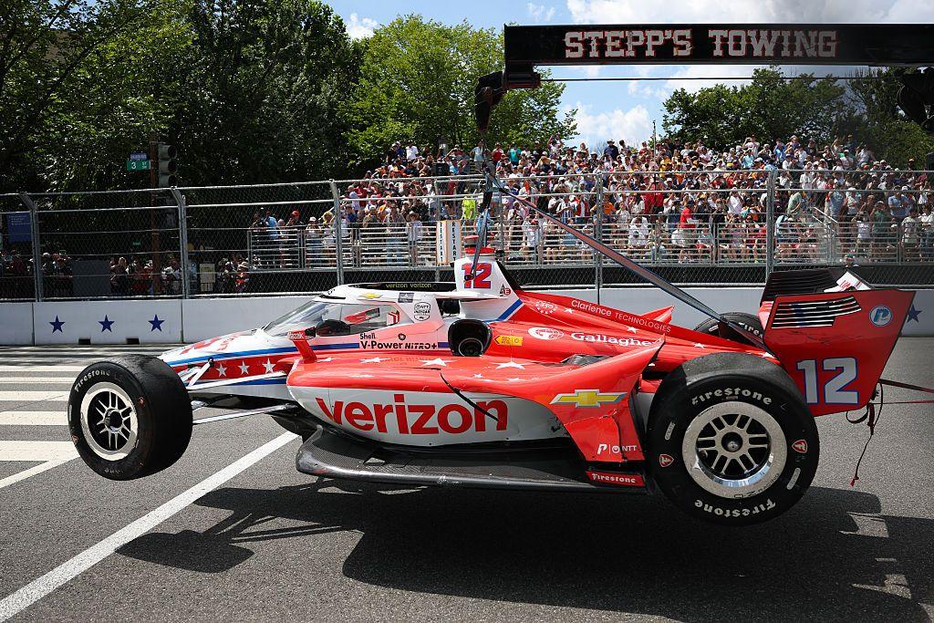 Image caption,Driver David Malukas' car is carried out after crashing