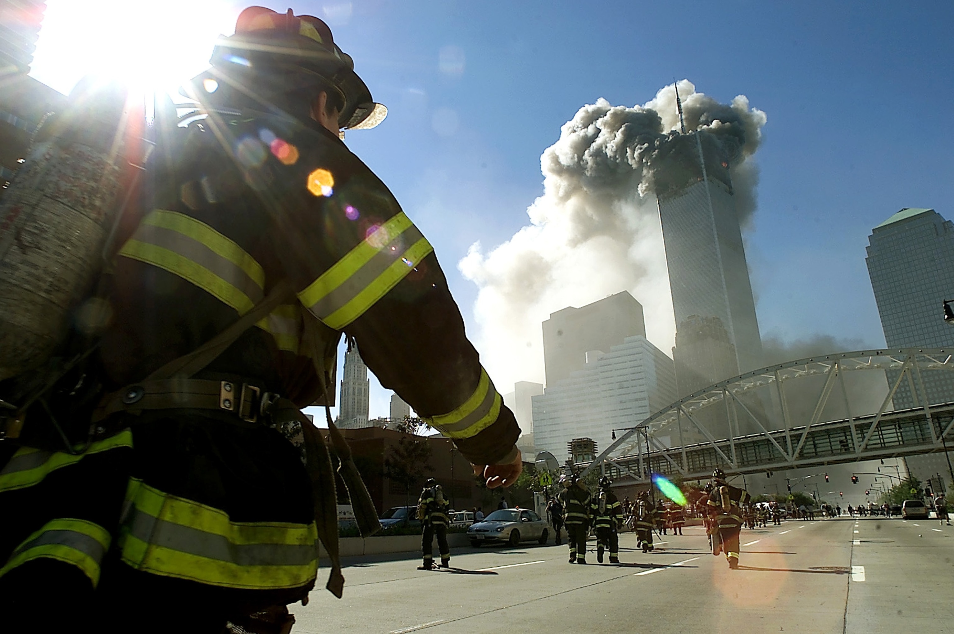 Firefighters walk toward one of the towers at the World Trade Center before it collapsed after a plane hit the building Sept. 11, 2001, in New York City. (Photo by Jose Jimenez/Primera Hora/Getty Images)Jose Jimenez/primera Hora/Getty Images NA