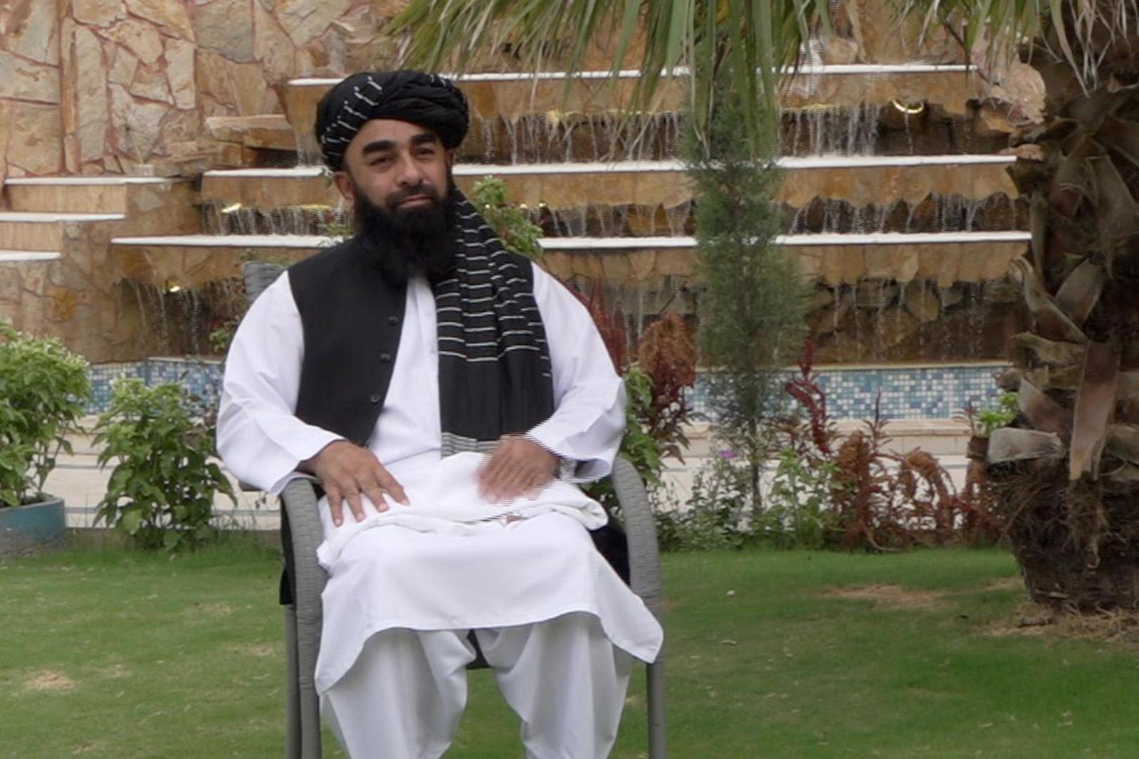 Image caption,Zabihullah Mujahid says women's rights and freedom of speech need to be seen "through the Sharia lens"