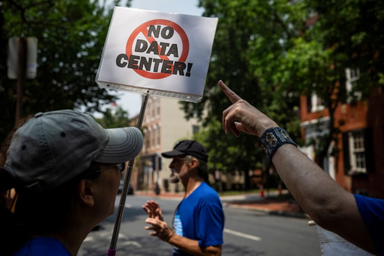 A protest against artificial intelligence outside Winchester Hall in Frederick, Md., last month.Graeme Sloan / Bloomberg via Getty Images
