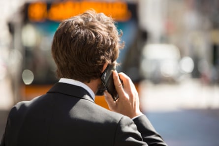 A pedestrian speaks on a mobile smartphone in Milan, ItalyPhotograph: Bloomberg/Getty Images