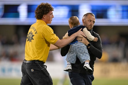 PayPal Park security escorted the toddler off the field and handed them to a woman, presumably the child’s mother.Photograph: Brandon Vallance/Getty Images