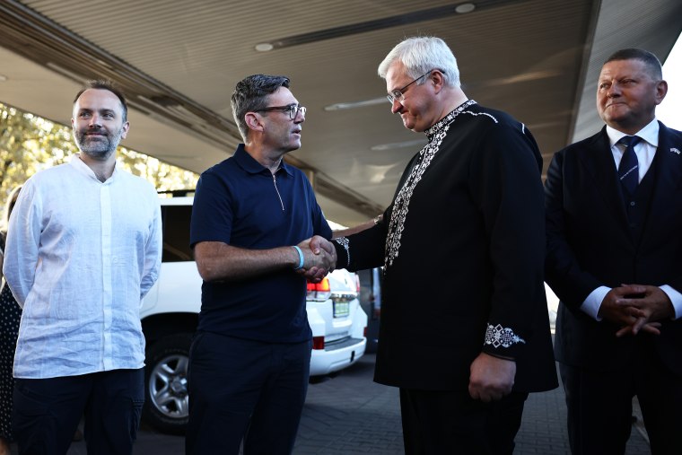 British Prime Minister Andy Burnham, center left, and Ukrainian Foreign Minister Andrii Sybiha, center right, in Kyiv, Ukraine, on Monday.Henry Nicholls / Getty Images