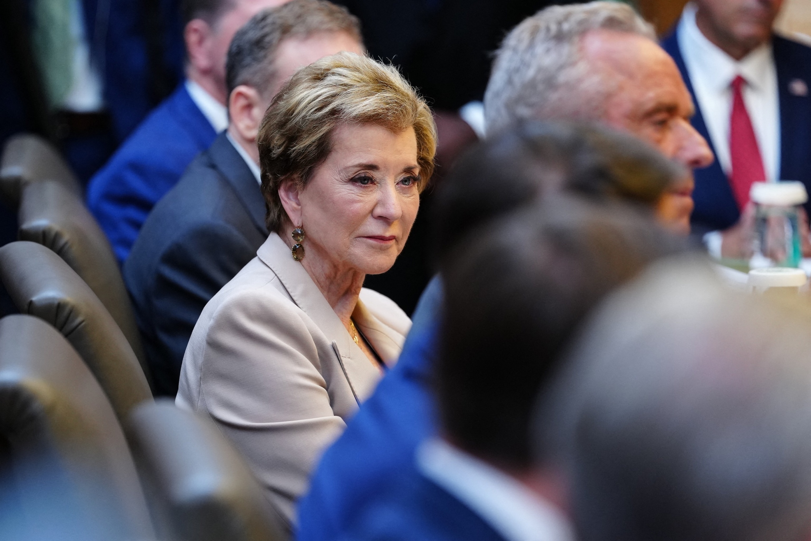 President Donald Trump listens as Secretary of Education Linda McMahon speaks during an event in the Rose Garden of the White House, August 24, 2026 in Washington.Win McNamee/Getty Images