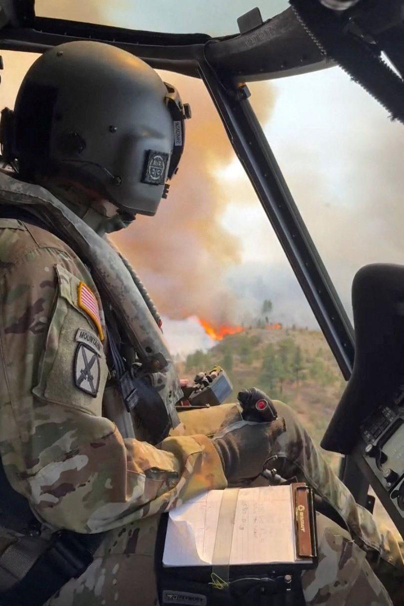 Image caption,The Nevada National Guard said 72 personnel, one Chinook and one Black Hawk helicopter had joined the response
