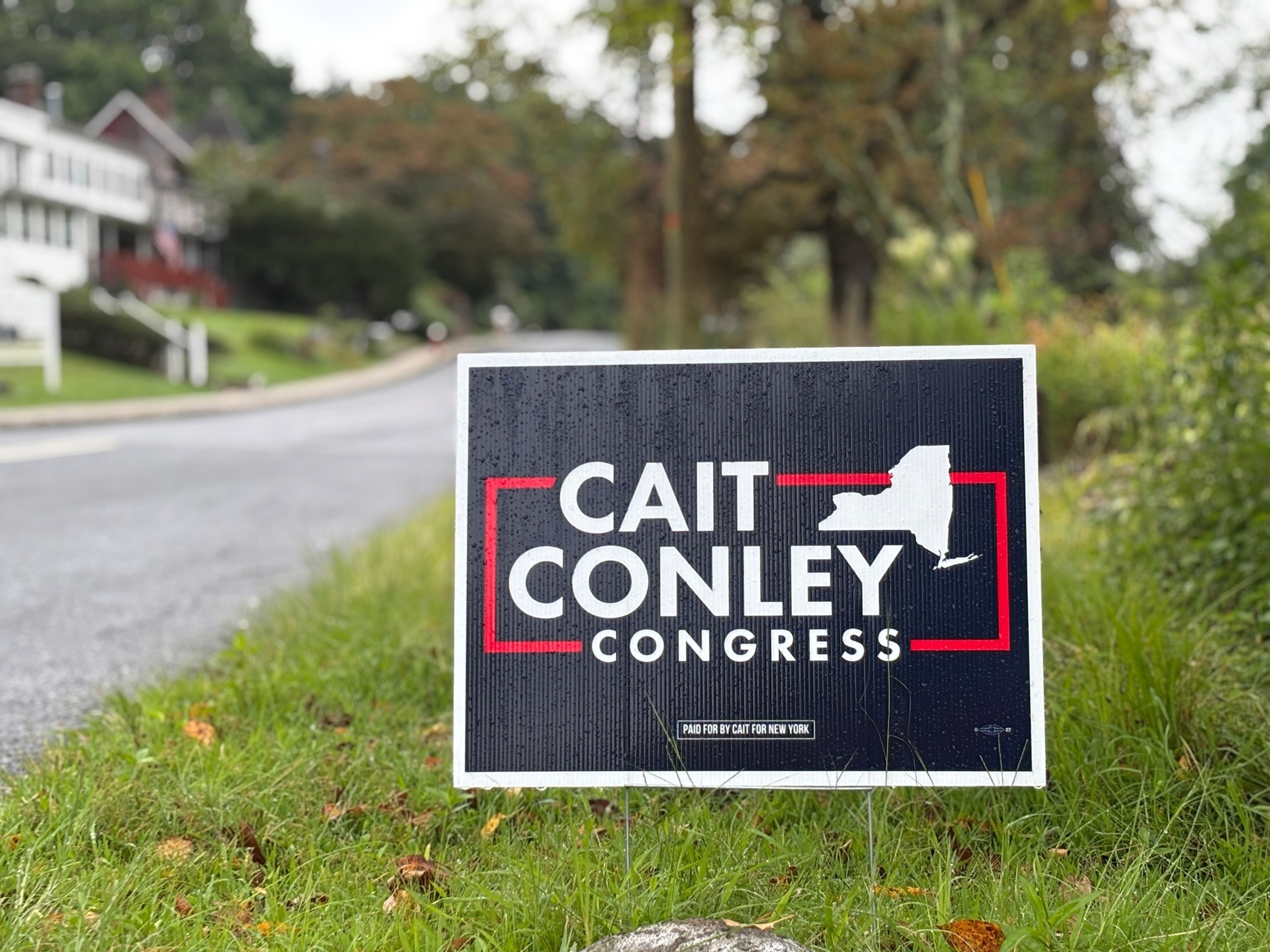 A sign supporting Cait Conley sits along a road in Piermont, New York.Jared Kofsky/ABC News