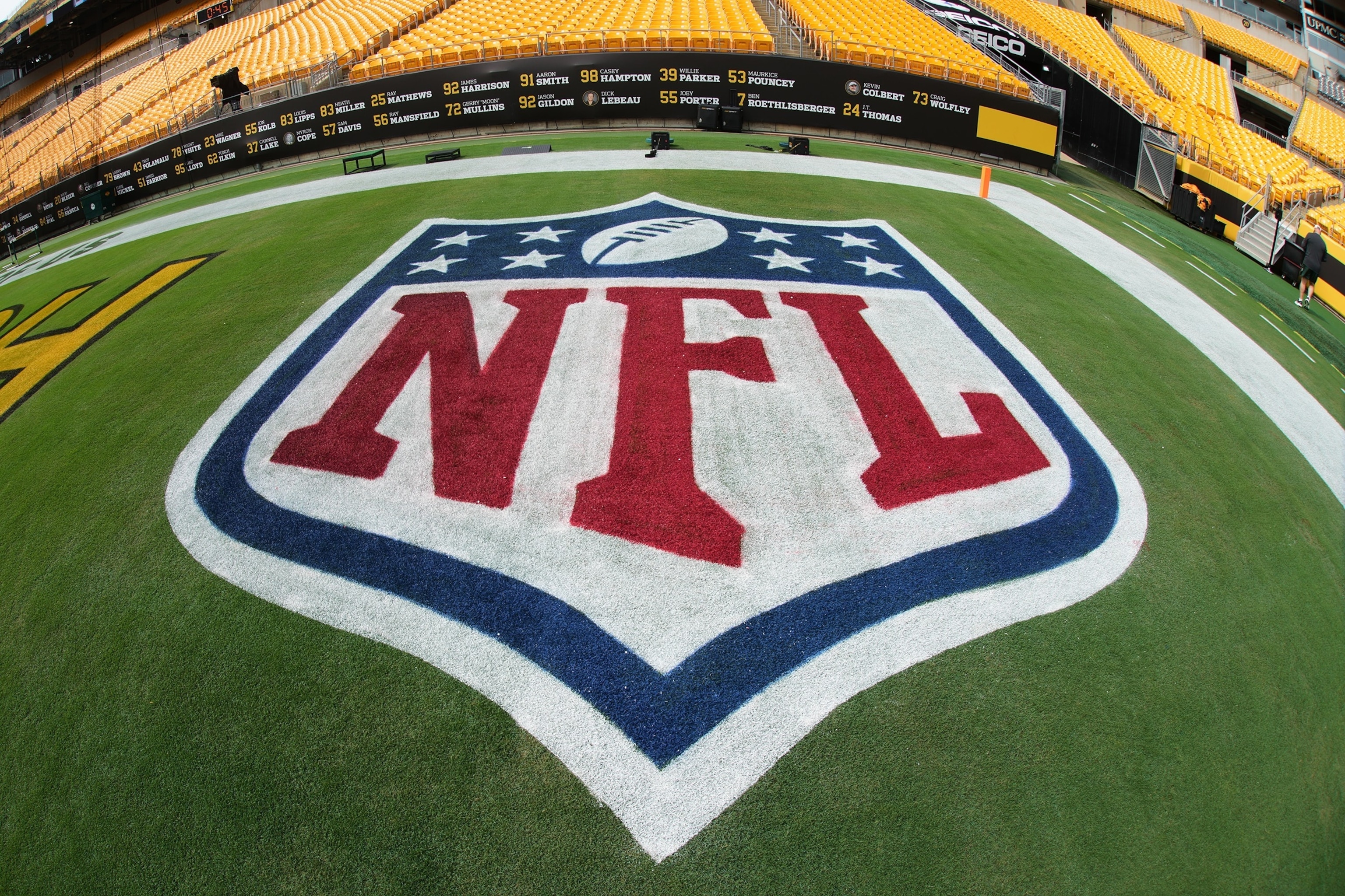 The NFL logo is shown the field before the start of a preseason NFL football game between the Green Bay Packers and the Pittsburgh Steelers in Pittsburgh, Aug. 13, 2026.Gene J. Puskar/AP Photo
