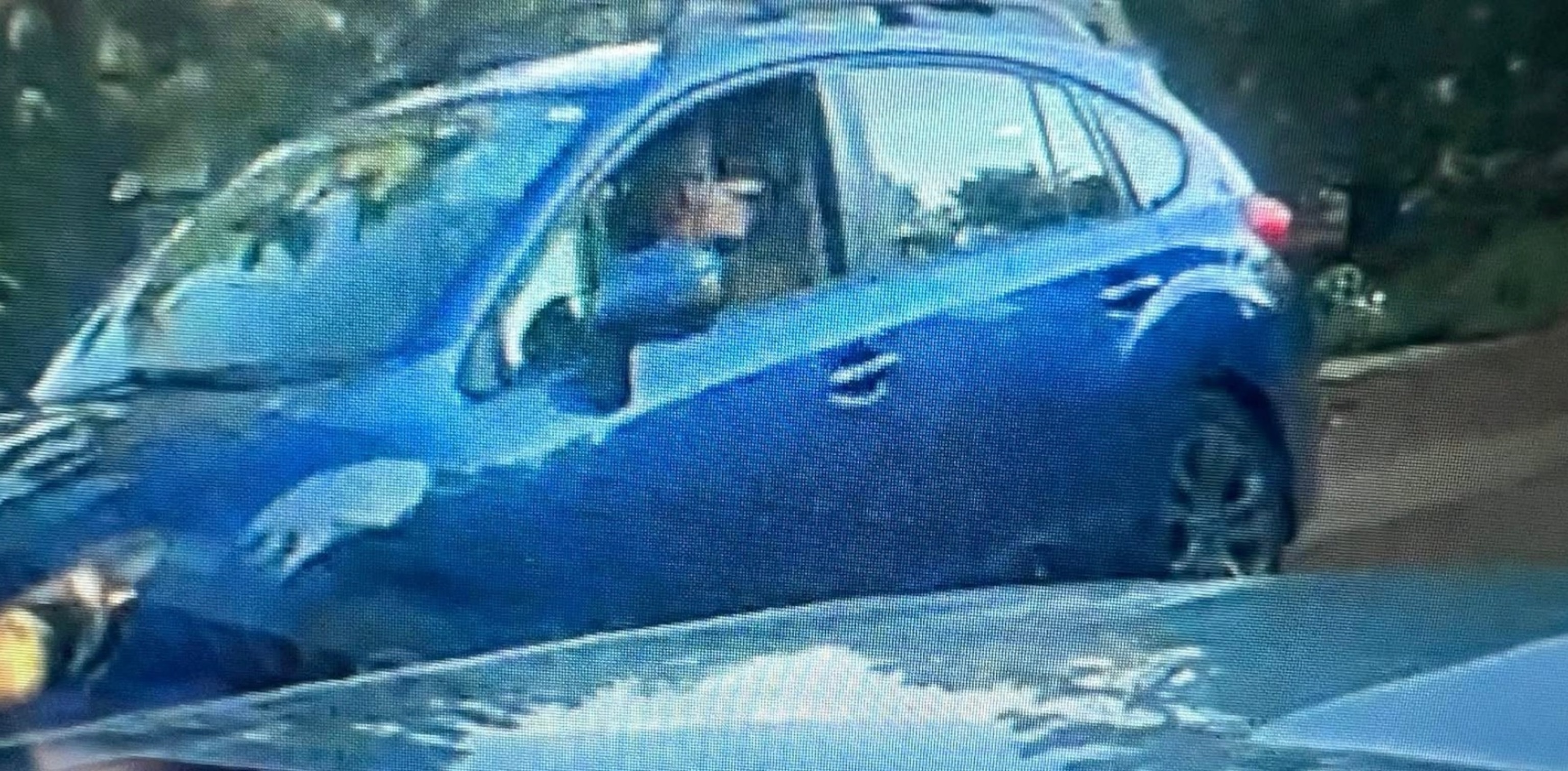 The Tiller County Sheriff's Office released this image of the suspect's vehicle. The white male assailant had brownish hair and drove a blue Subaru Imprezza hatchback with license plates not visible through tinted covers.Teller County Sheriff's Office