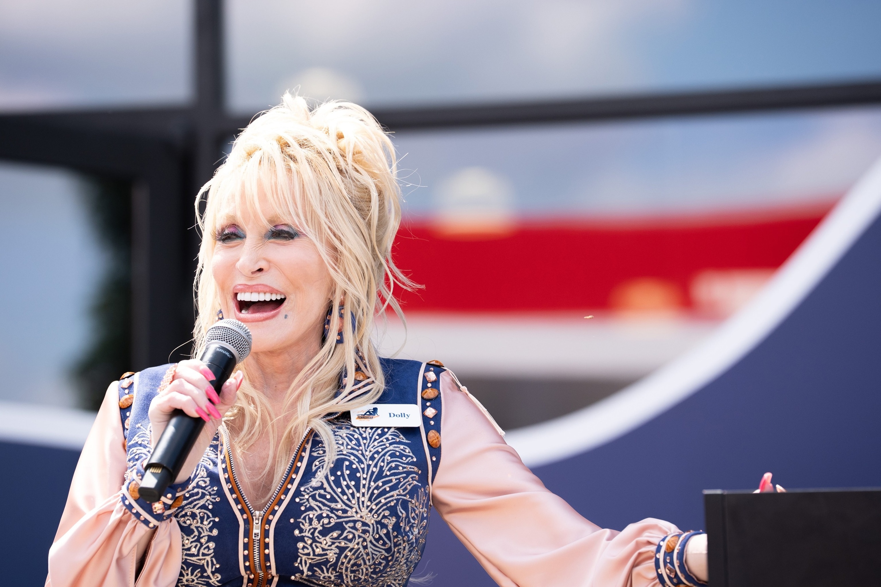 Dolly Parton speaks to the crowd during the grand opening of Dolly's Tennessean Travel Stop in Cornersville, Tennessee, June 24, 2026.Nicole Hester/The Tennessean via USA TODAY Network via Reuters Connect