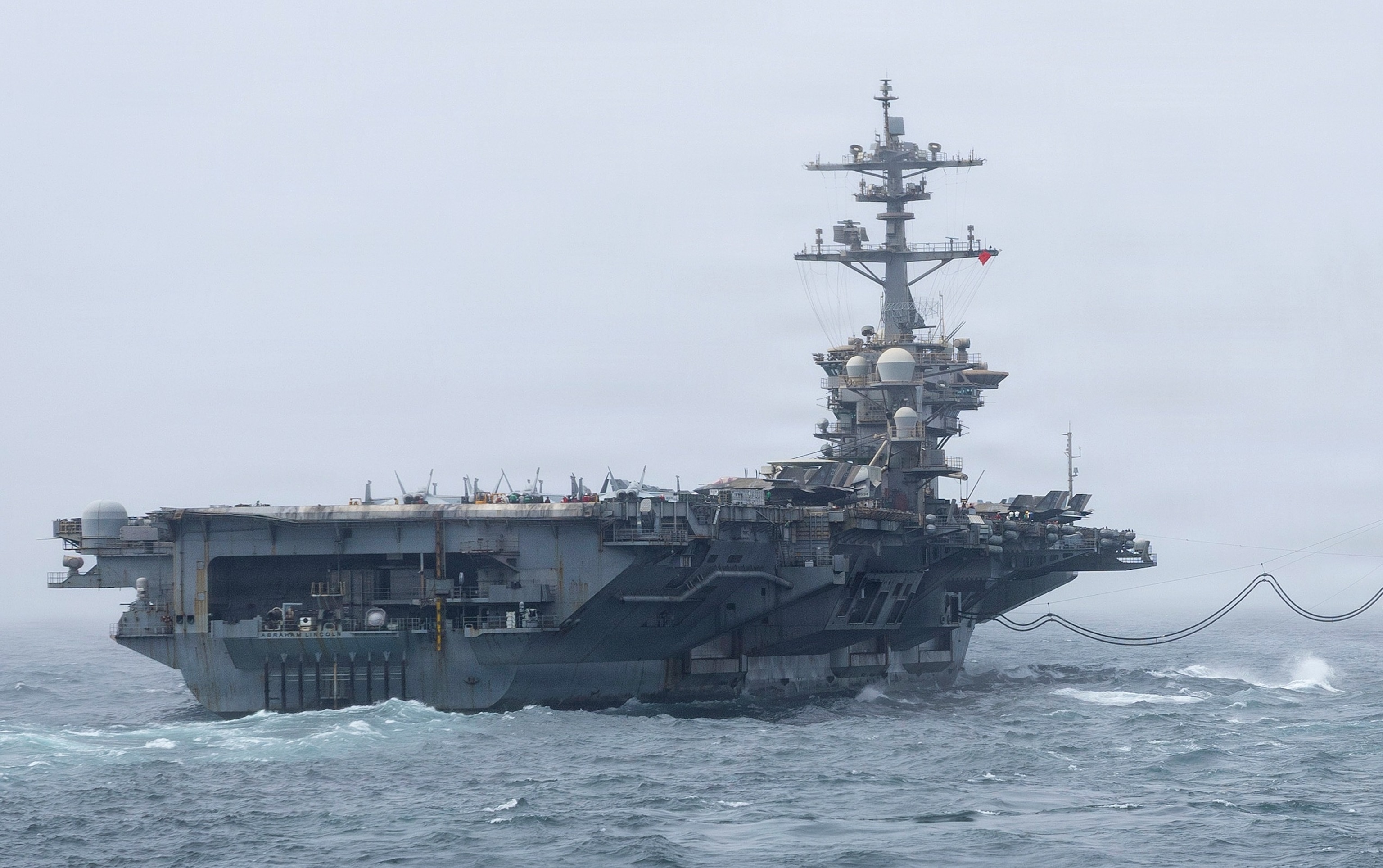 Nimitz-class aircraft carrier USS Abraham Lincoln conducts a replenishment-at-sea, Aug. 16, 2026.US Navy