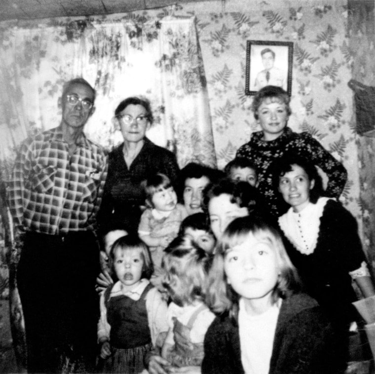 Dolly Parton, top right, and her family at Christmas in 1960. Parton was the fourth of 12 children.MediaPunch Inc / Alamy Stock Photo