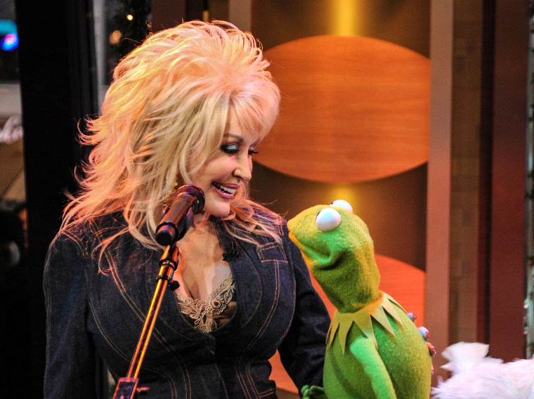Dolly Parton duets with Kermit the Frog on "Good Morning America" in 2012.Donna Svennevik / Disneyvia Getty Images