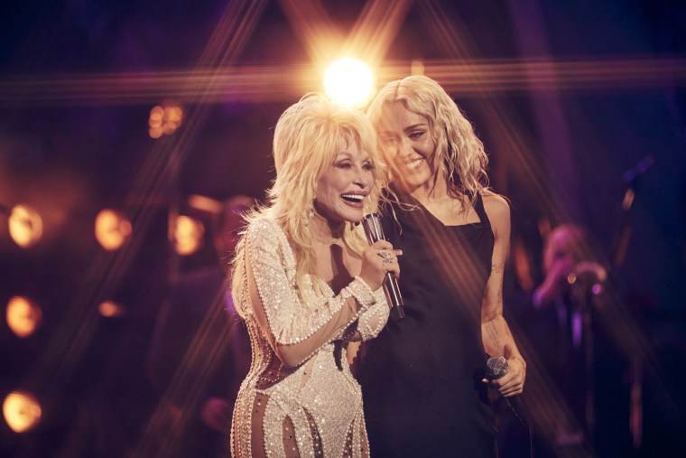 Dolly Parton and her goddaughter Miley Cyrus in 2022.Vijat Mohindra / NBC