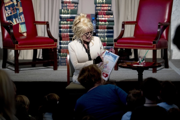 Parton's organization Imagination Library donated millions of books to children, with its 100 millionth going to the Library of Congress.Andrew Harnik / AP file
