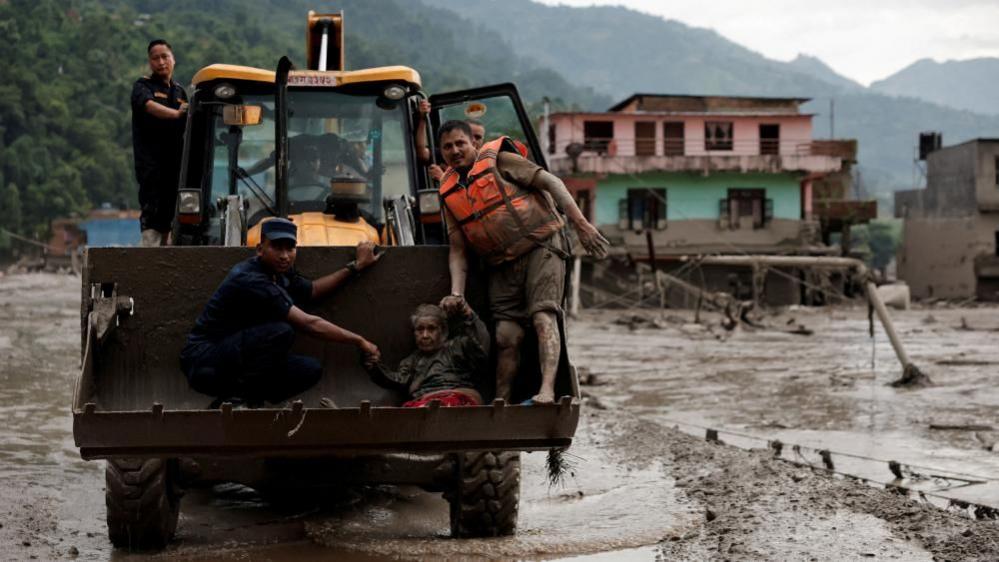 Image caption,Survivors were seen being rescued