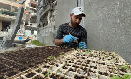 Yousef at work in 2024. He was killed by a drone-fired missile that year aged 24.Photograph: Amjed Tantesh/The Guardian