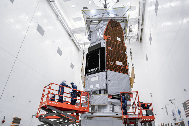 Technicians at NASA’s Kennedy Space Center work on the Nancy Grace Roman Space Telescope.Sydney Rohde / NASA