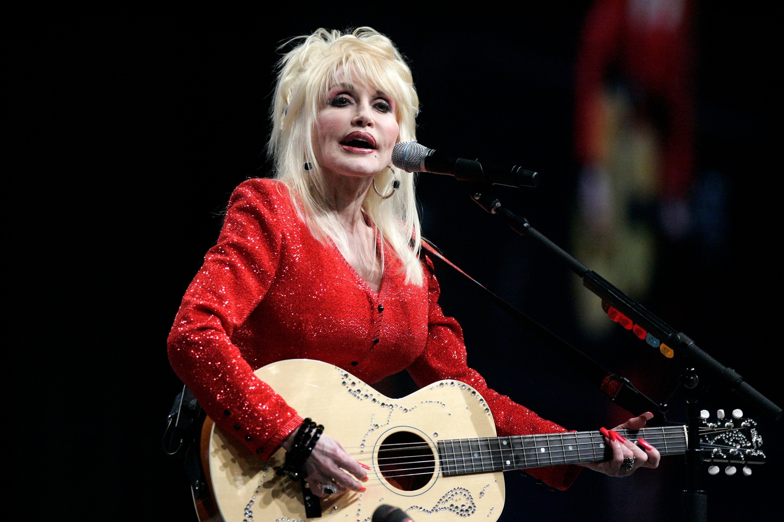 Dolly Parton performs at a United Way of America convention in Detroit, May 15, 2009.Carlos Osorio/AP Photo