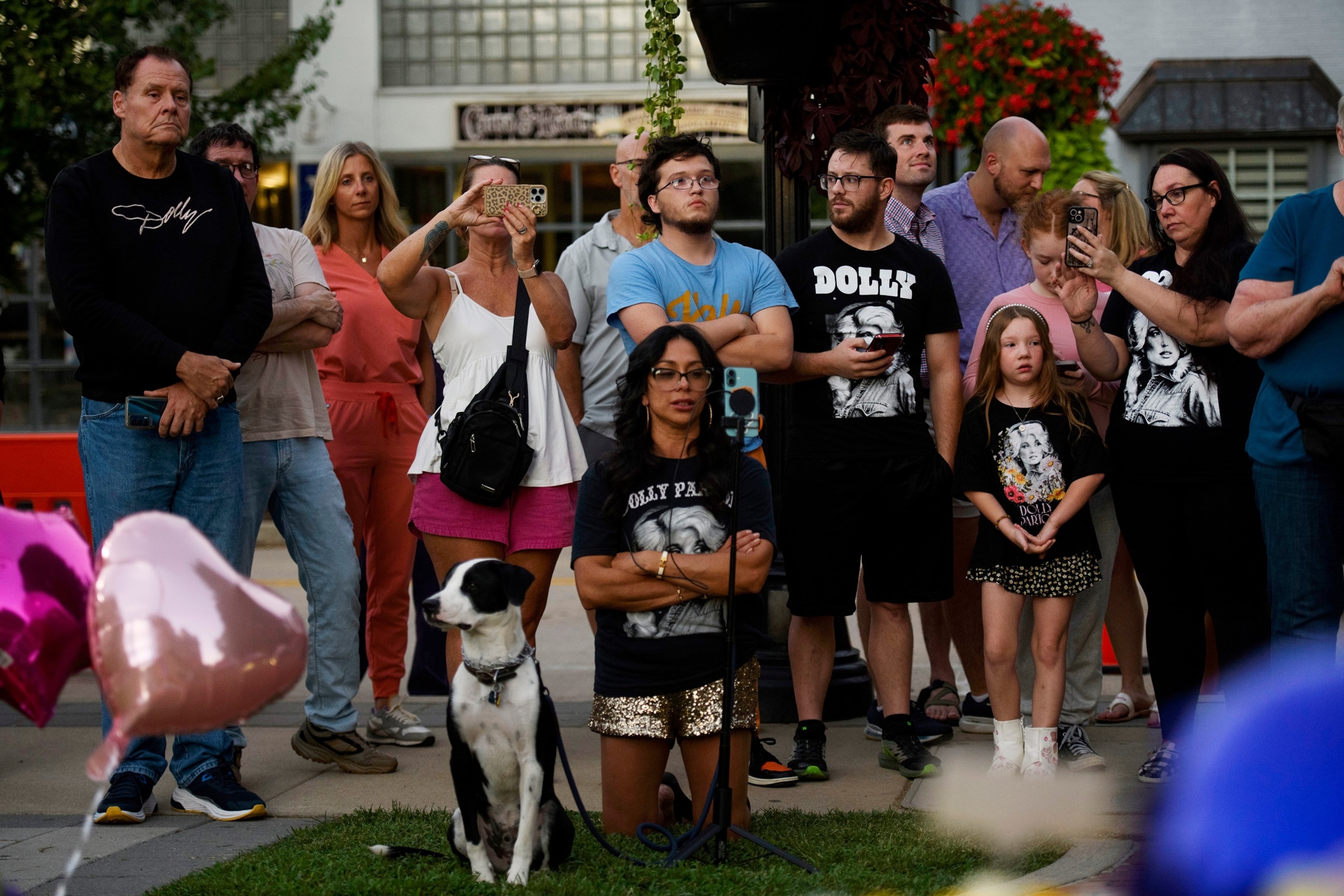 Fans pay tribute to Dolly Parton at her statue situated on the lawn at the Sevier County Courthouse, August 25, 2026 in Sevierville, Tennessee.Melissa Sue Gerrits/Getty Images