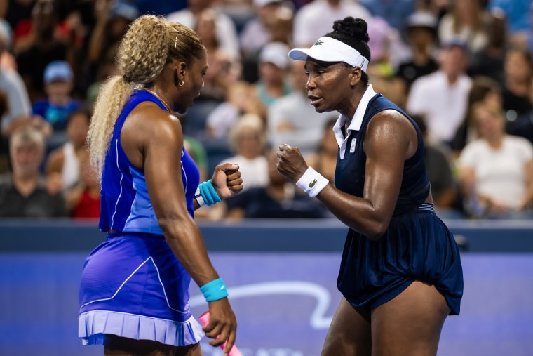 Serena and Venus Williams in the first round at the Cincinnati Open in Mason, Ohio, on Aug. 17.Robert Prange / Getty Images file
