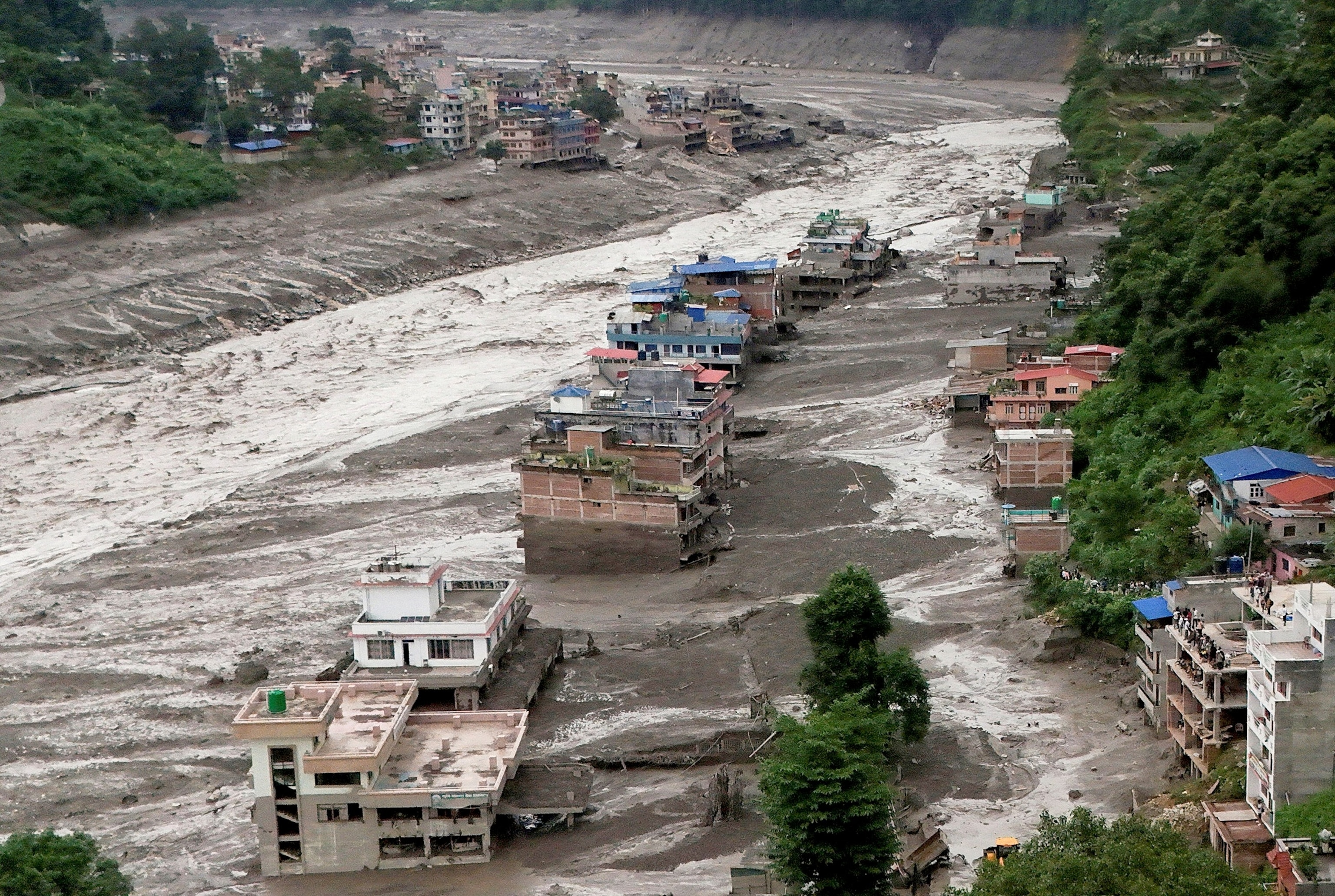 A drove view of mud covered properties following a flash flood at Trishuli in Nuwakot district, Nepal, August 26, 2026.Navesh Chitrakar/Reuters