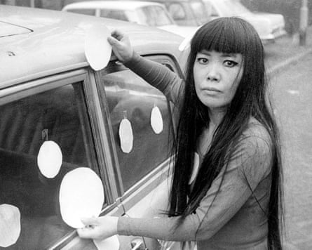 Kusama next to her Dot Car (1965) in Scheveningen, the Netherlands.Photograph: Harrie Verstappen