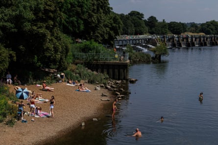 Swimmers at Teddington Lock on the River Thames, 9 July 2026.Photograph: Dan Kitwood/Getty Images