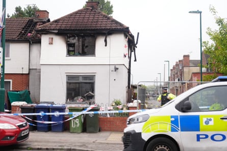 Police officers at the scene in Grangetown on Thursday morning.Photograph: Owen Humphreys/PA