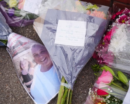 Floral tributes to Natalie and Valentina in Grangetown.Photograph: Owen Humphreys/PA