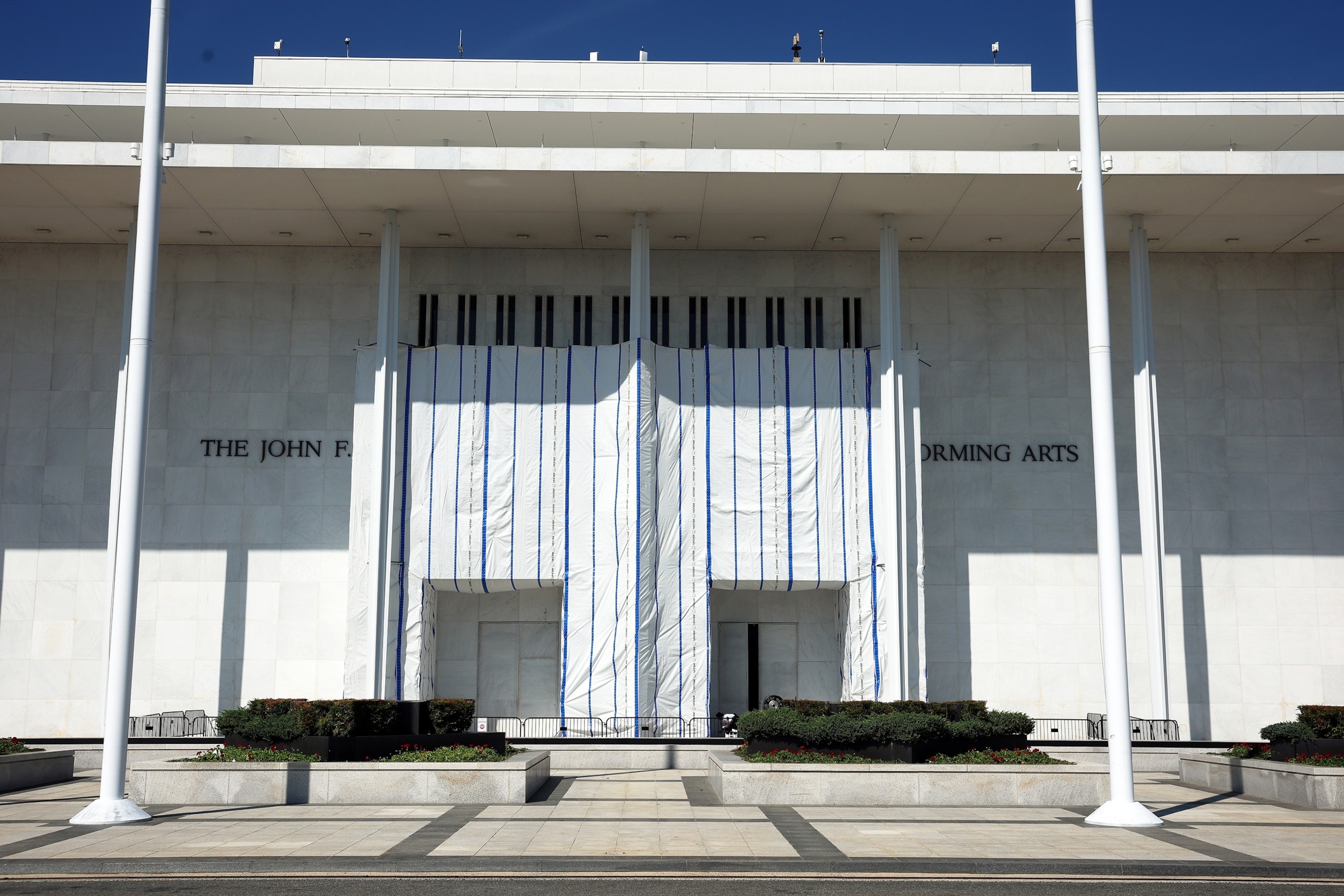A tarp remains in place on the facade of the John F. Kennedy Center for the Performing Arts on Aug. 25, 2026, in Washington, D.C.Kevin Dietsch/Getty Images