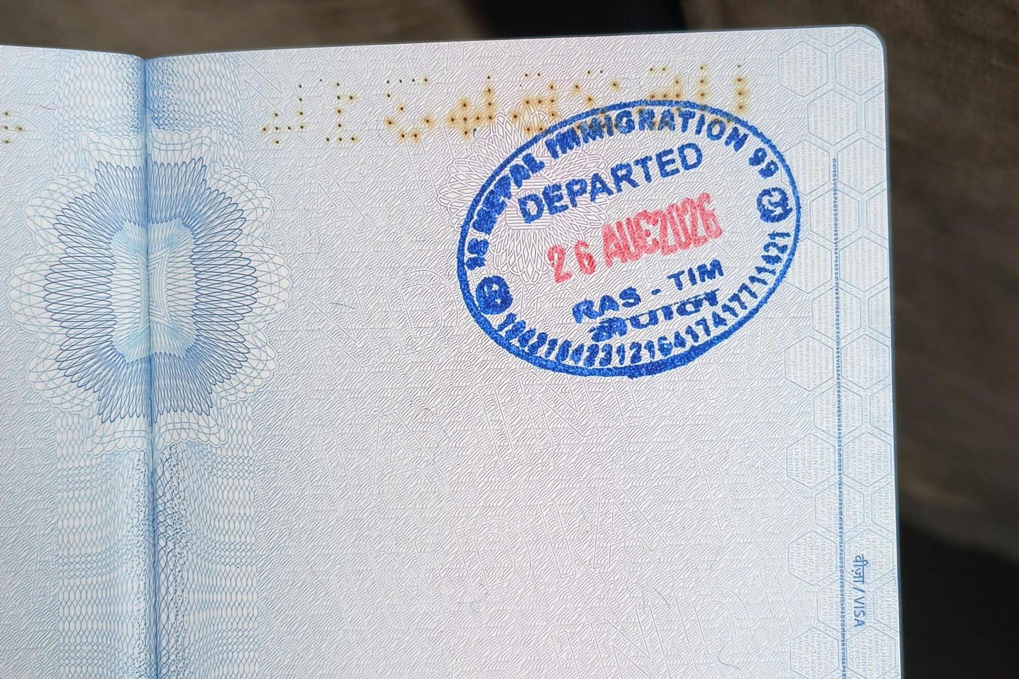 Image caption,Chakraborty sent her husband a photograph showing her Nepal immigration clearance before she crossed towards Chinese immigration (blurred from source)