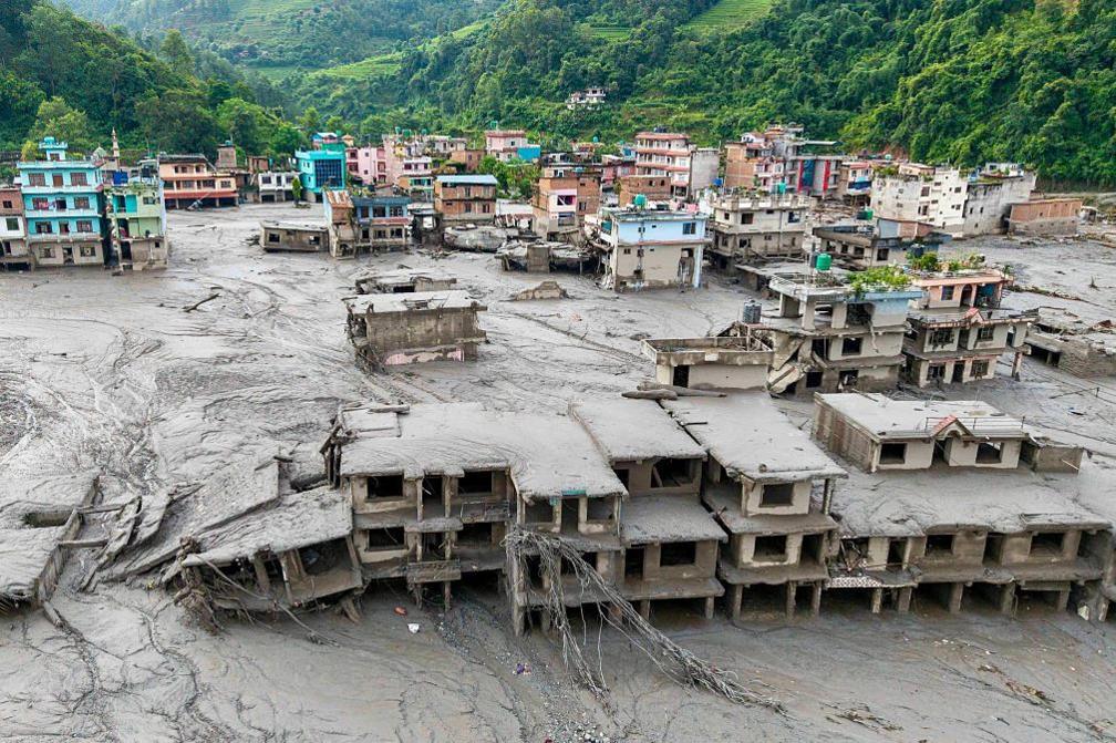 Image caption,The death toll has risen to 475, more than 48 hours after flash floods devastated the Himalayan border region