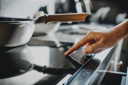 Induction cookers are more efficient, can reduce costs, are safer and make it easier for air conditioning to work in crowded kitchen environments.Photograph: Getty Images