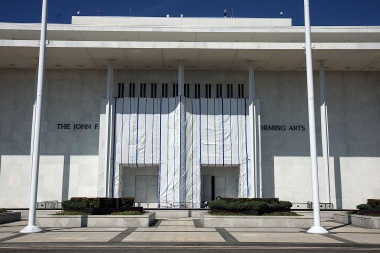 A tarp remains in place on the facade of the John F. Kennedy Center for the Performing Arts.Kevin Dietsch / Getty Images file