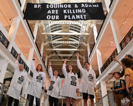 Scientist Rebellion activists demonstrate in the Science Museum’s energy hall against the museum’s sponsorship by Adani, BP and Equinor.Photograph: Andrea Domeniconi/Alamy