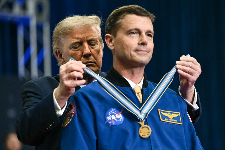 Trump presents a Congressional Space Medal of Honor to NASA astronaut and commander Reid Wiseman.Kent Nishimura / AFP via Getty Images