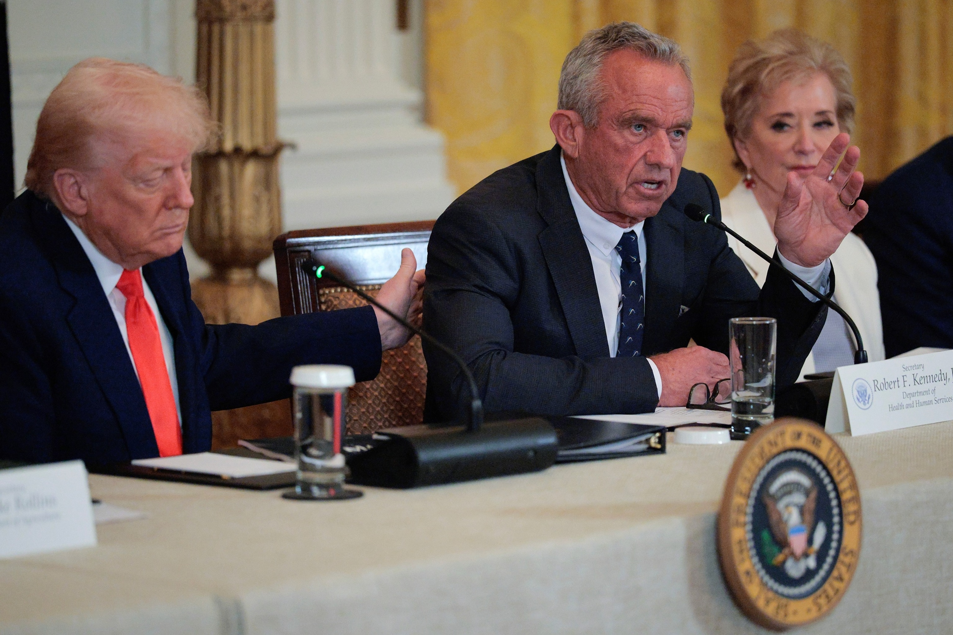 President Donald Trump and Health and Human Services Secretary Robert F. Kennedy Jr. hold an event for a new Make America Healthy Again Commission report in the East Room of the White House on May 22, 2025 in Washington.Chip Somodevilla/Getty Images