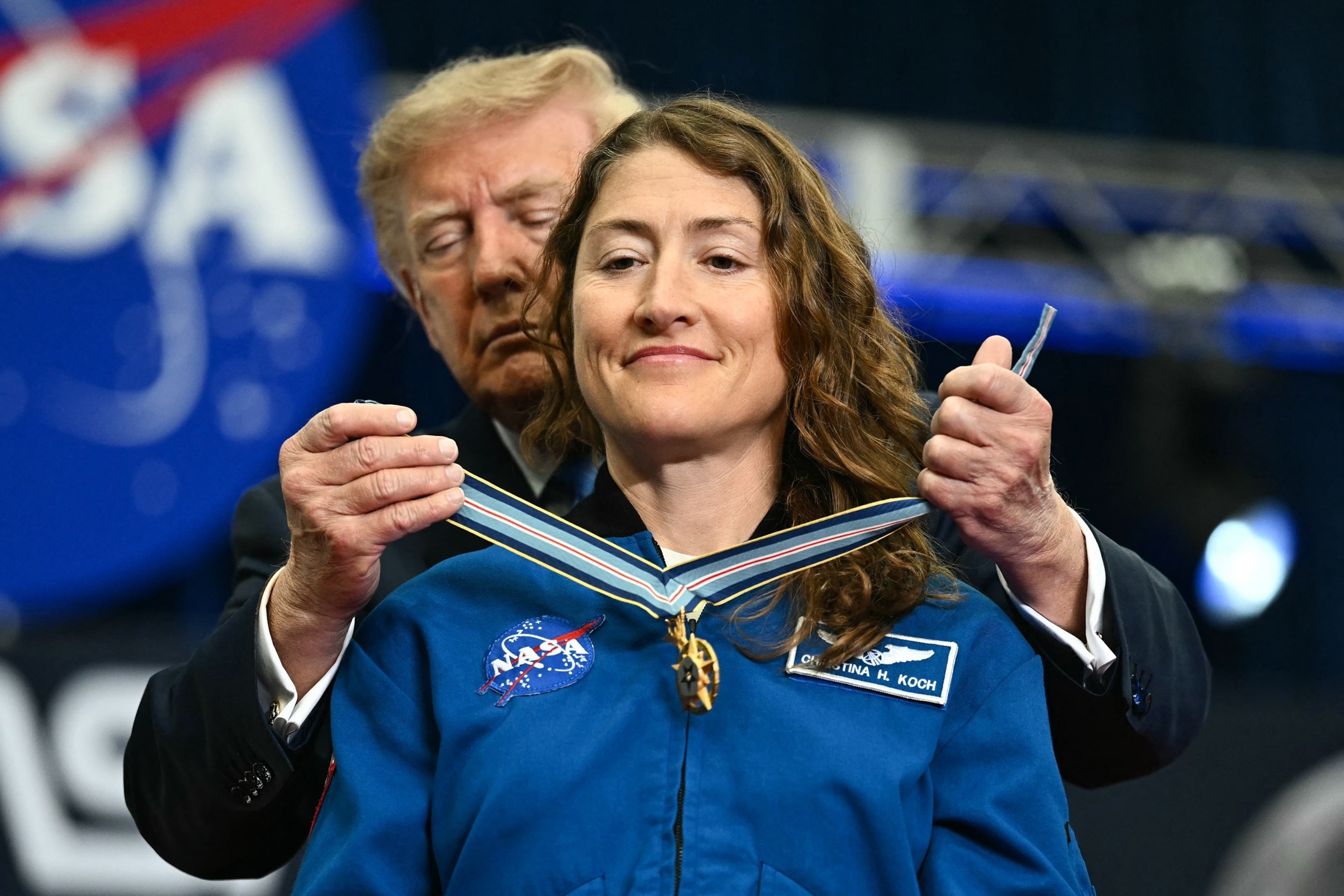 President Donald Trump presents a Congressional Space Medal of Honor to NASA astronaut and mission specialist Christina Koch at NASA Lyndon B. Johnson Space Center in Houston, Texas, August 28, 2026.Kent Nishimura/AFP via Getty Images