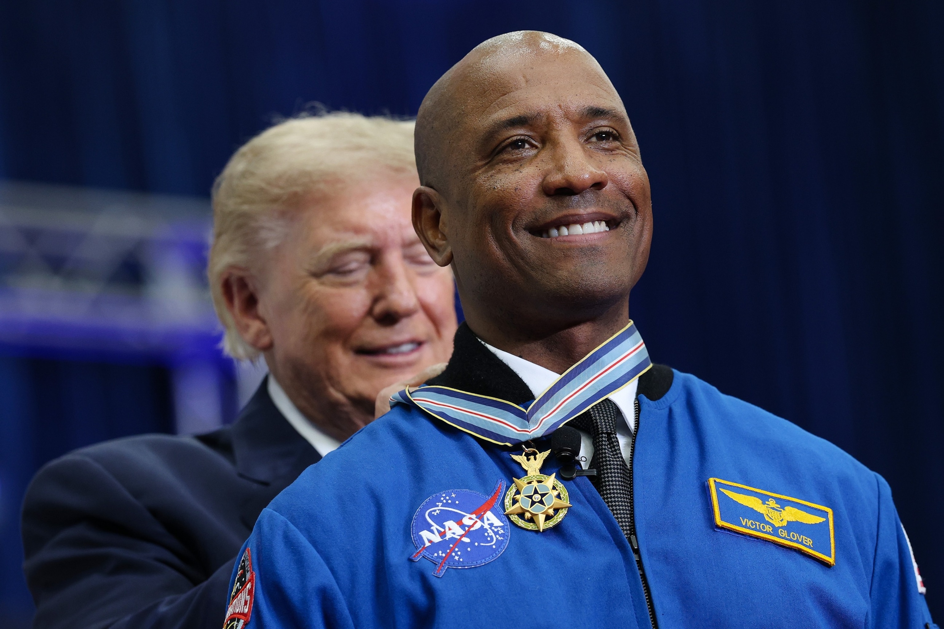 President Donald Trump, awards the Congressional Space Medal of Honor to pilot Victor Glover during a ceremony honoring Artemis II crew members at NASA's Johnson Space Center, August 28, 2026 in Houston, Texas.Win McNamee/Getty Images
