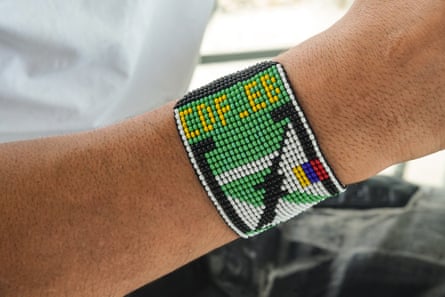 A wristband with the logo of the armed group to which Adrián, 19, belonged.Photograph: Daniela Díaz/The Guardian