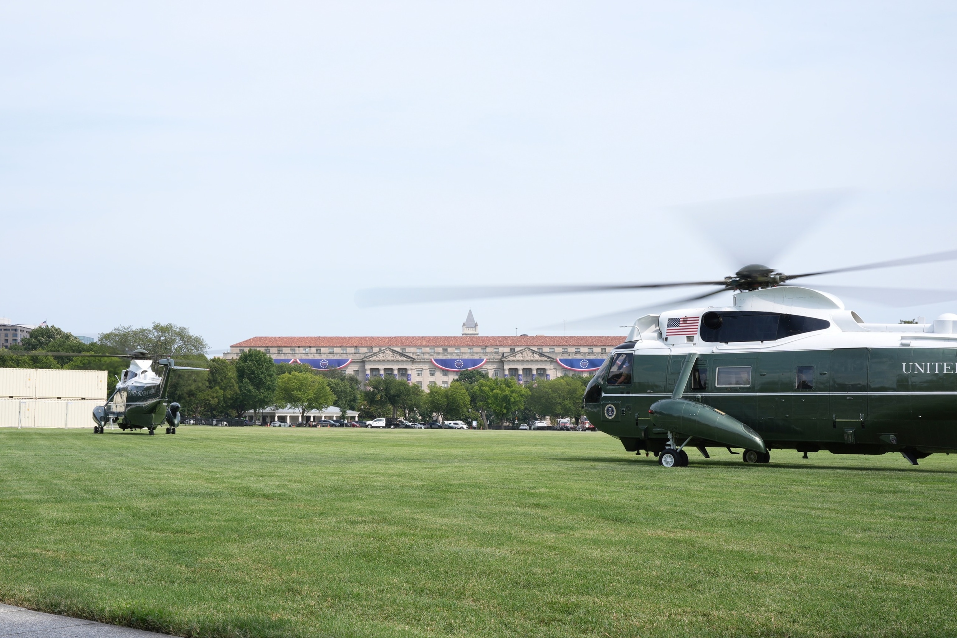 Marine One with President Donald Trump on board, left, and a presidential support helicopter prepare to lift off from the Ellipse near the White House, Aug. 27, 2026, in Washington, D.C., en route to Houston.Jacquelyn Martin/AP Photo